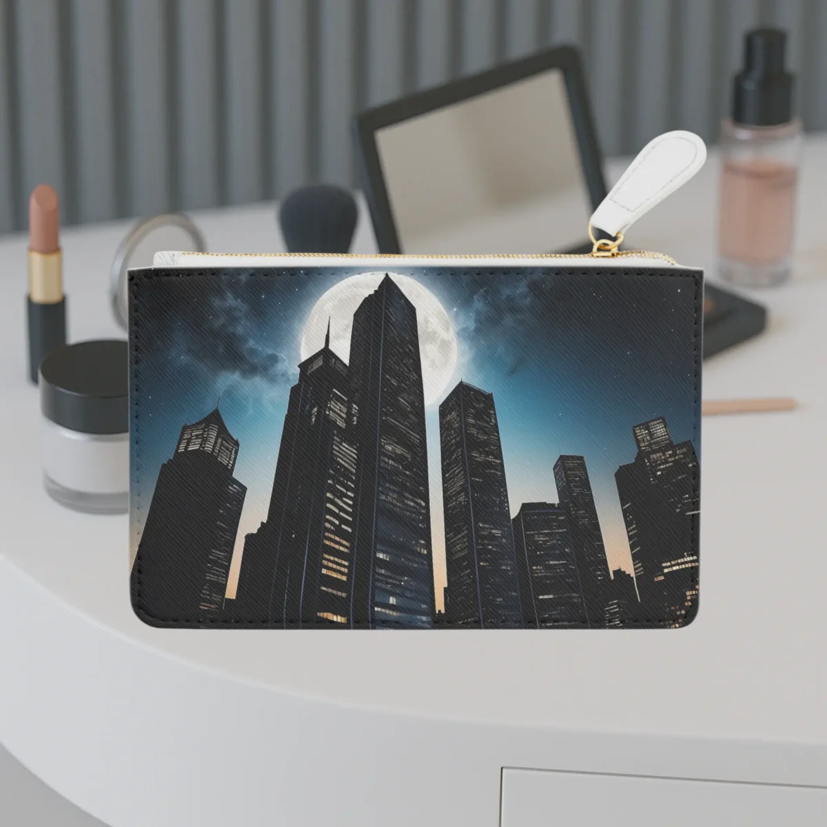 Front view of the Skyscraper mini clutch bag featuring a night city skyline with skyscrapers and a full moon.