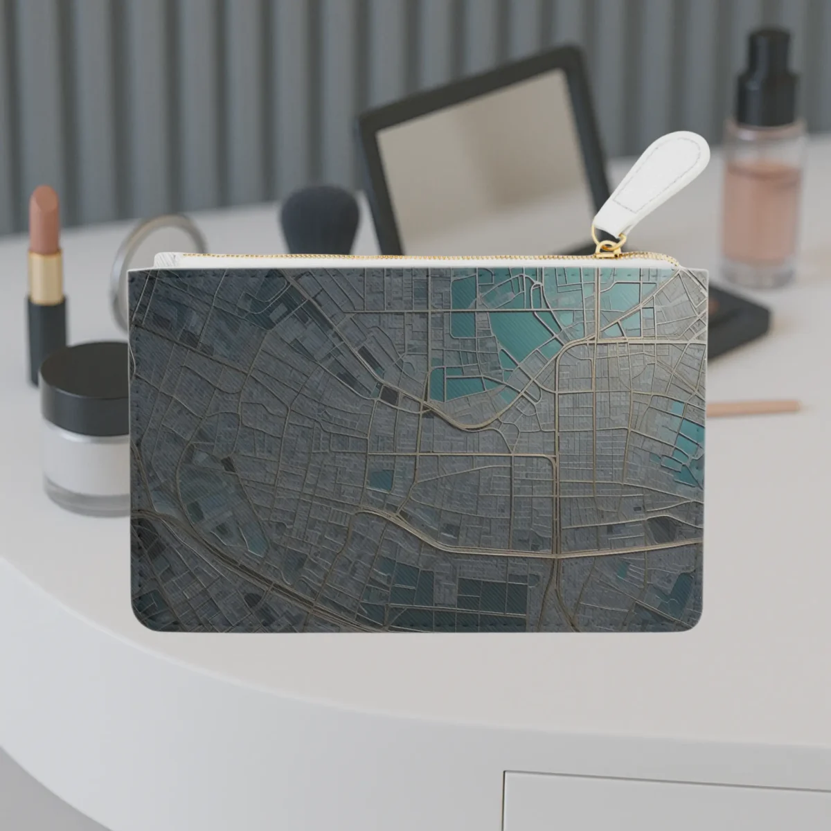 Front view of the Urban Grids mini clutch bag featuring a stylized city map design in shades of grey and teal.