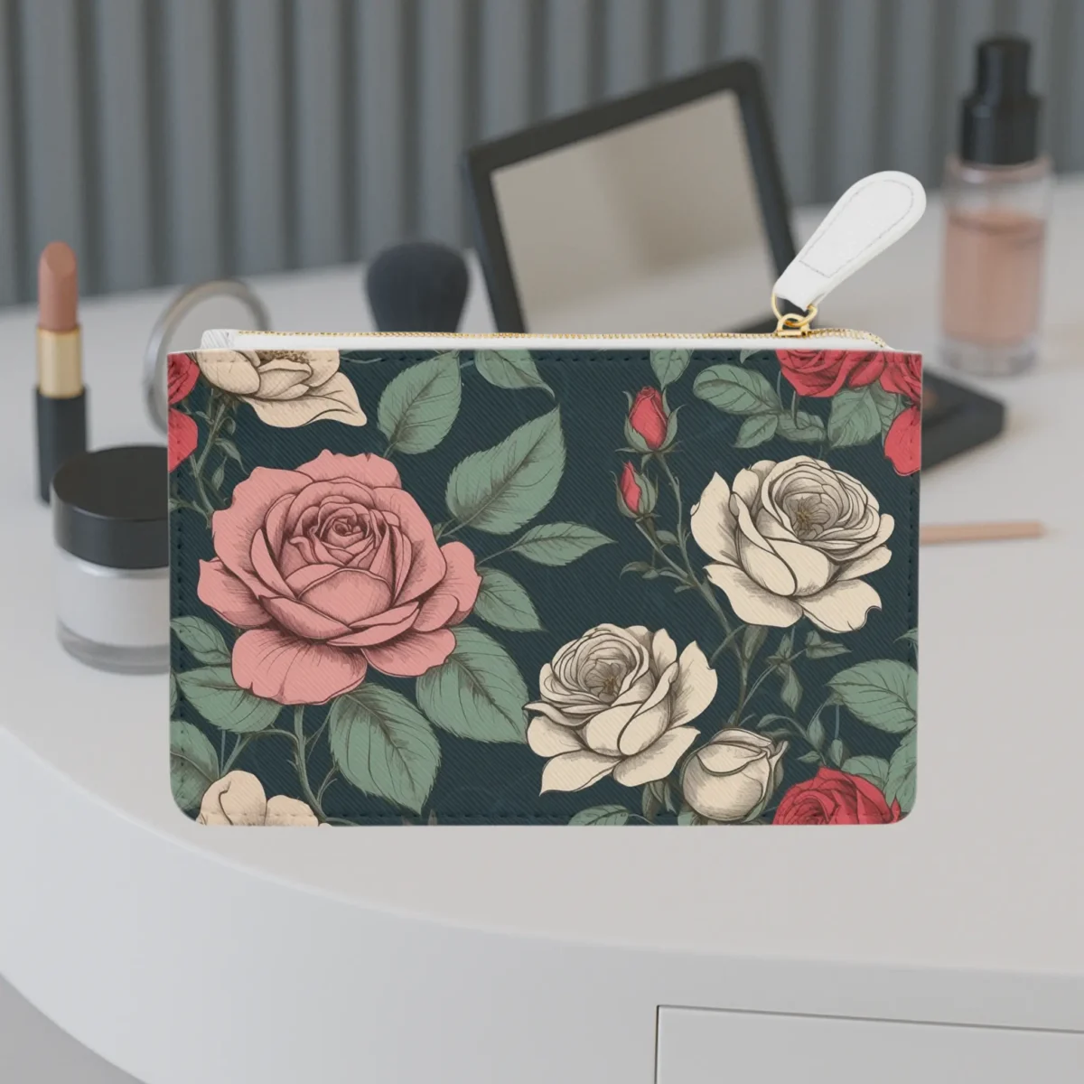 Front view of the Vintage Rose mini clutch bag featuring a classic floral pattern with red, white, and pink roses on a dark background.
