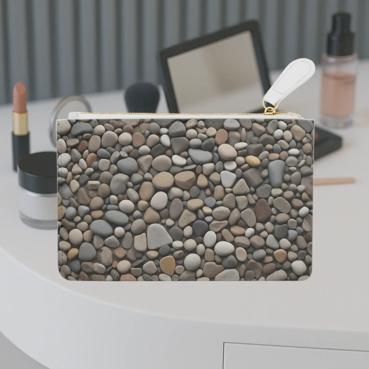 Mini clutch bag with a realistic river stone pattern in natural earth tones