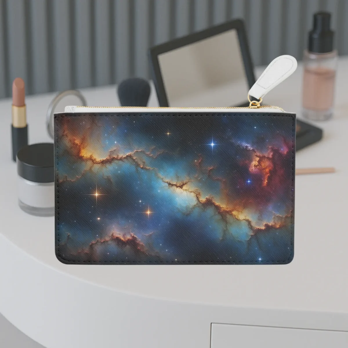 Mini clutch bag with vivid galaxy-inspired design featuring stars and cosmic clouds