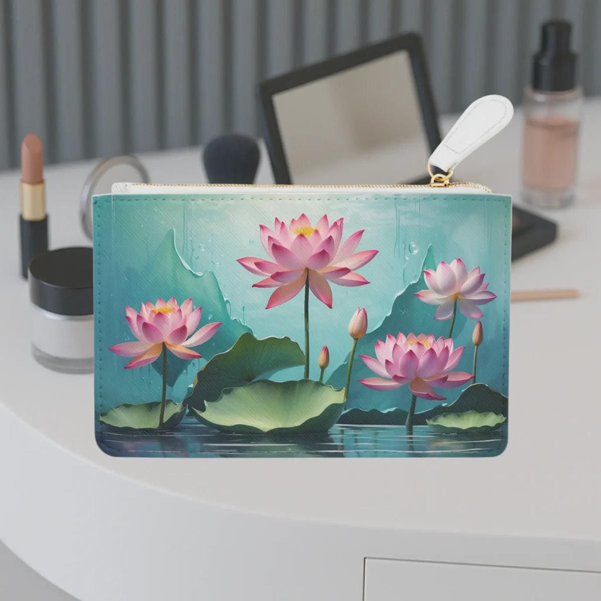 Mini clutch bag with vibrant pink lotus flower illustration on a tranquil water background
