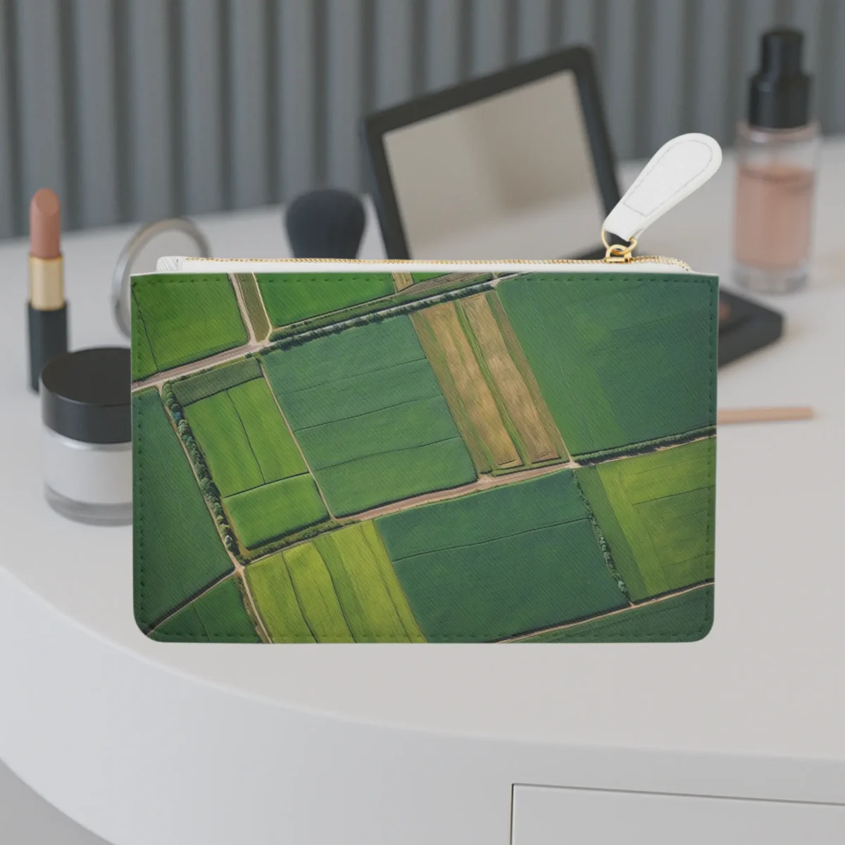Front view of the View of Farmlands mini clutch bag featuring a vivid aerial landscape of green agricultural fields.