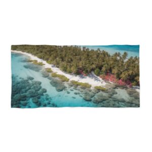 Aerial view of tropical beach with palm trees, coral reefs, and clear blue water beach towel