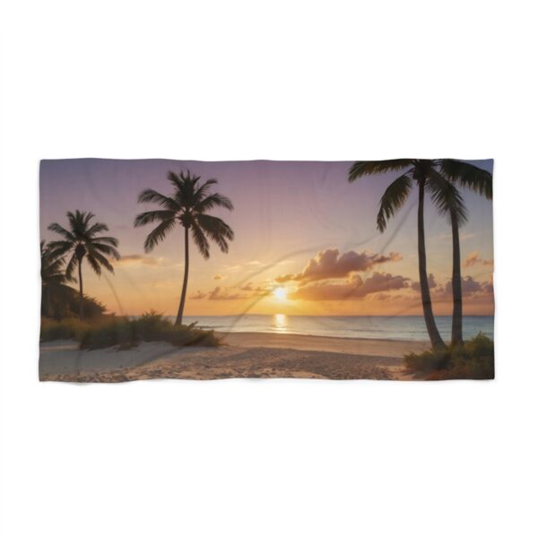 Tropical beach at sunset with palm trees and calm water beach towel