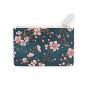 Cherry blossoms drifting across a silk brocade pattern on a Mini Clutch Bag.