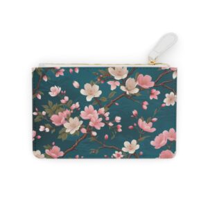 Elegant cherry blossoms drifting over a silk brocade pattern on a Mini Clutch Bag.