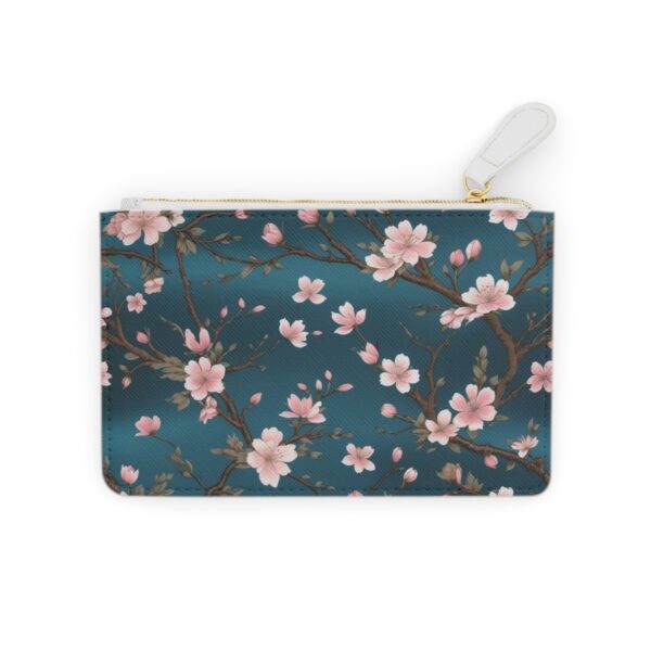 Cherry blossoms drifting across a silk brocade pattern on a Mini Clutch Bag.