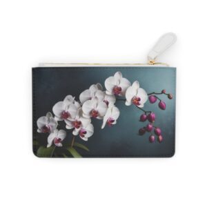 Mini clutch bag with white orchids cascading against soft velvet textures