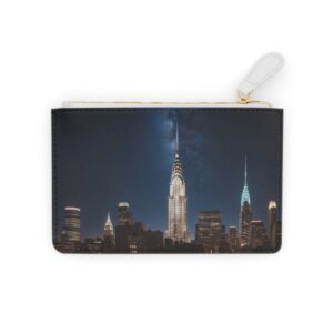 Chrysler Building spire illuminated under a starry night sky