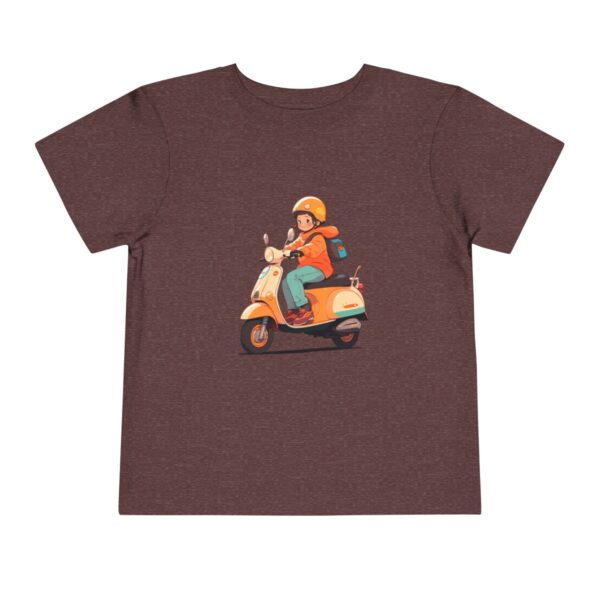 Toddler Short Sleeve Tee with a smiling rider on a scooter design