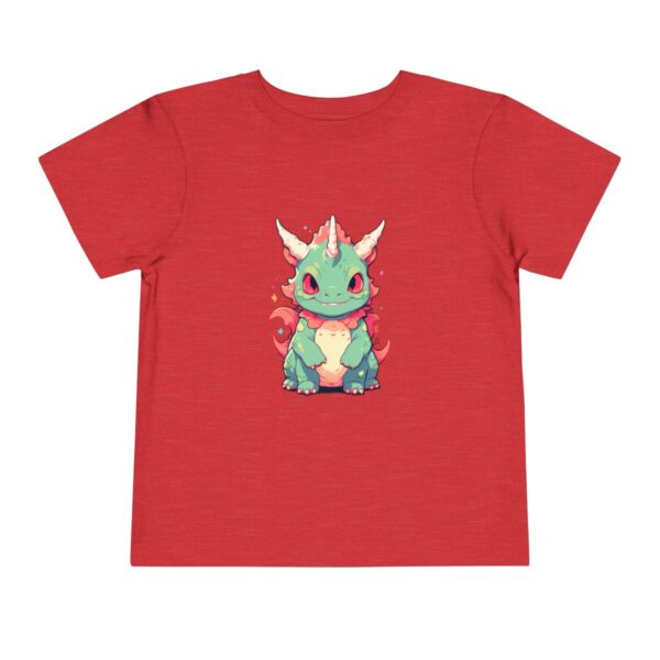 Toddler Short Sleeve Tee with adorable green and pink carnotaurus design