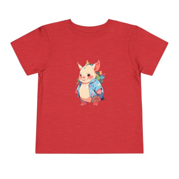 Toddler short sleeve tee with a smiling rhinoceros design on a red background