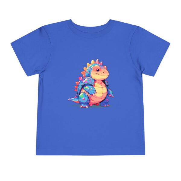 Toddler short sleeve tee with a smiling Ankylosaurus design on a blue background