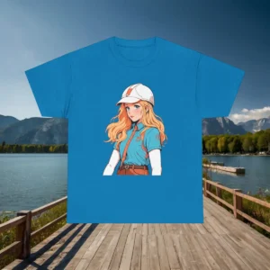 Flatlay of a blue t-shirt with an anime equestrian girl design, displayed on a dock near a lake.