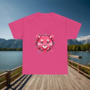 Flatlay of hot pink t-shirt with stylized pink leopard face and colorful paint splashes