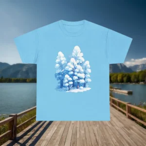 Flat lay of light blue t-shirt with a frosty winter forest tree illustration