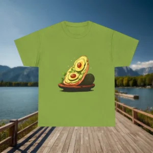Green avocado toast t-shirt displayed flat on a wooden dock with a lake and mountains in the background.
