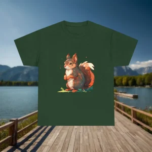 Green t-shirt with a cute illustrated squirrel graphic displayed outdoors near a lake