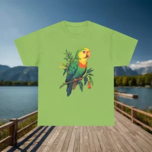 Flatlay of light green t-shirt with detailed tropical parrot illustration on branch