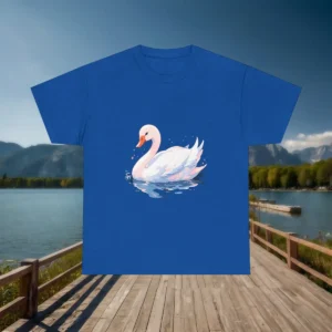 Royal blue t-shirt with a detailed white swan graphic, displayed over a lake background