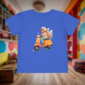 Flat lay of royal blue toddler t-shirt with colorful illustration of a child riding a scooter