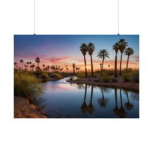 Palm trees reflected in a calm river during sunset in a desert landscape with vibrant skies.