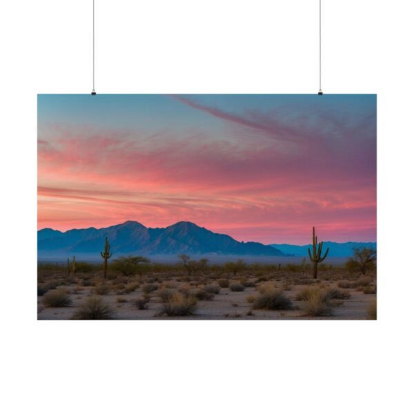 Desert landscape with scattered cacti, distant mountains, and a vibrant pink and blue sunset sky.