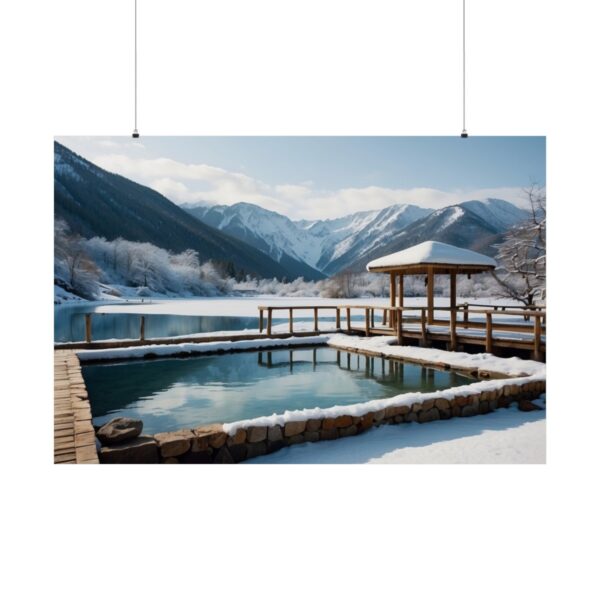 Snow-covered mountain lake with a wooden pavilion and clear water reflecting surrounding peaks under a bright sky.