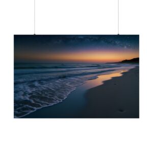 Calm beach at twilight with gentle waves and a soft glow from the fading sunset, transitioning into a starry night sky.