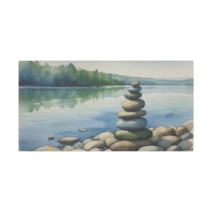 stacked stones on a tranquil lakeshore with calm water