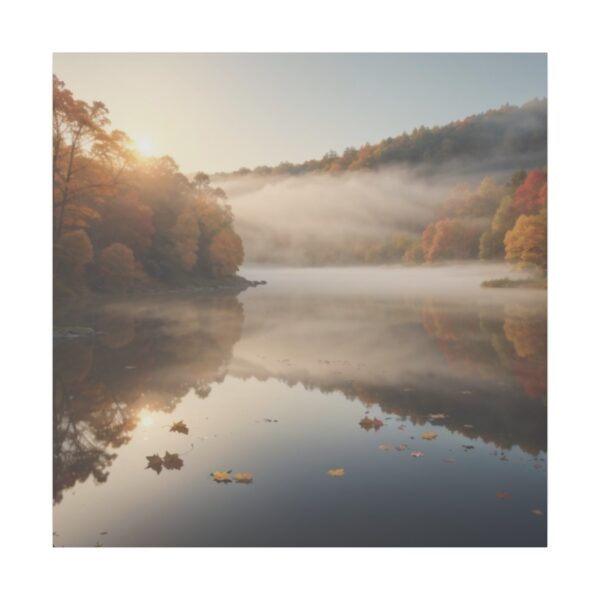 Misty sunrise over a calm lake surrounded by autumn trees with soft reflections on the water