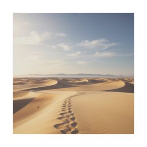 Expansive desert landscape with golden sand dunes under a clear blue sky, featuring a trail of footprints