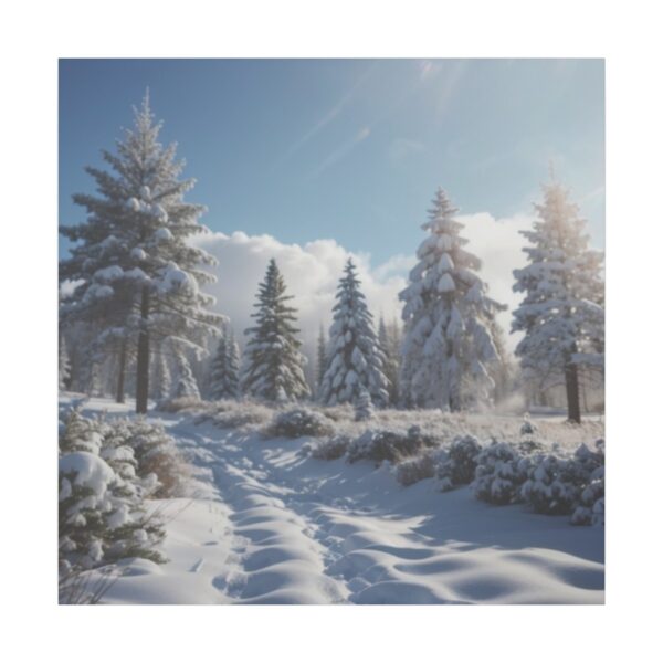 Snow-covered trees and a path winding through a serene winter landscape under a clear blue sky