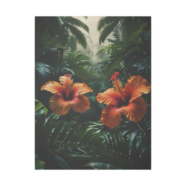 Two vibrant hibiscus flowers amidst lush tropical foliage