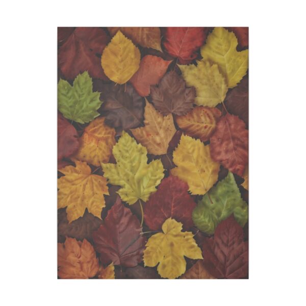 A collection of colorful autumn leaves in shades of yellow, orange, red, and green