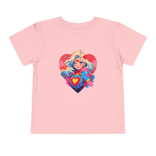 Pink toddler short sleeve tee with a vibrant superheroine illustration featuring a heart background