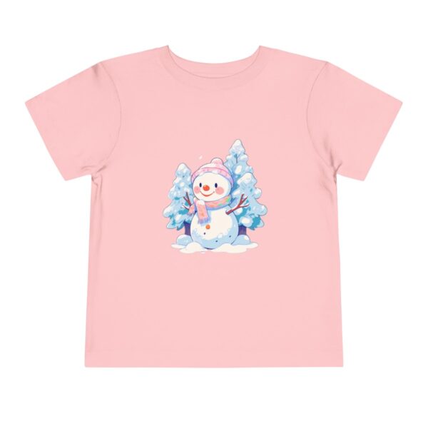 Pink toddler short sleeve tee with a cute snowman and snow-covered trees illustration