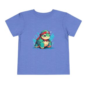 Toddler short sleeve tee with a pirate sea turtle design on a light blue background