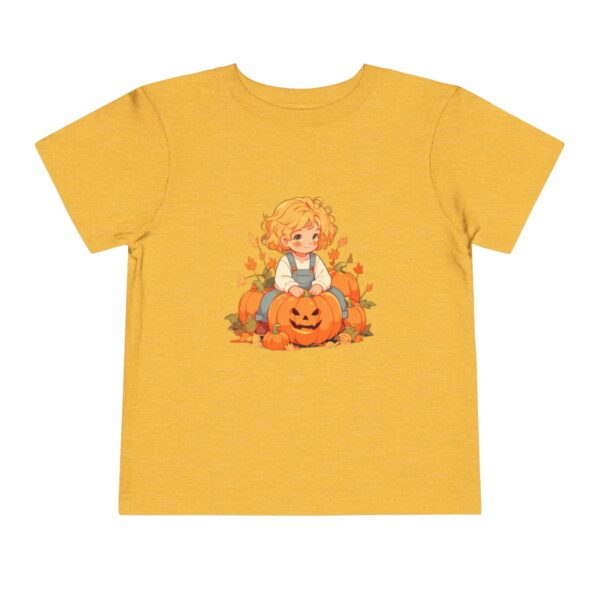 Yellow toddler short sleeve tee with a fall scene illustration featuring a child sitting with pumpkins