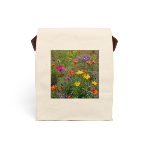 Canvas lunch bag with strap featuring a colorful wildflower field design