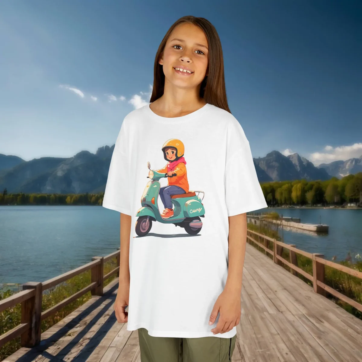 Girl wearing a white kids t-shirt with a cartoon-style scooter design showing a girl in a helmet and hoodie.