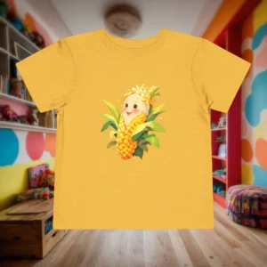 Flat lay of yellow toddler T-shirt with a cute corn character illustration