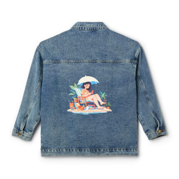 Denim jacket with a vacation-themed design showing a woman relaxing under an umbrella on the back