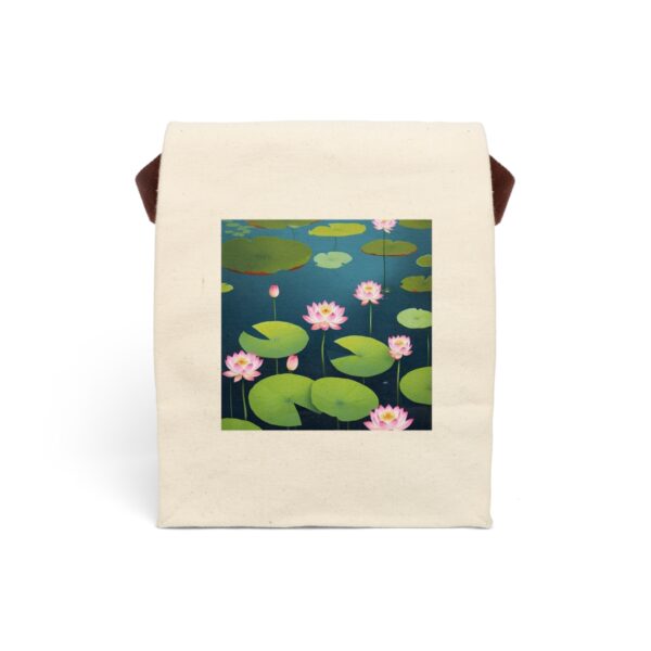 Canvas lunch bag with strap featuring a serene water lily pond design