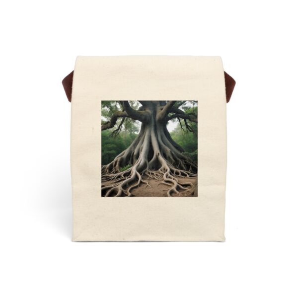 Canvas lunch bag with strap featuring a large tree with sprawling, exposed roots design