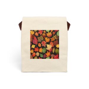 Canvas lunch bag with strap featuring a design of colorful autumn leaves in shades of red, orange, yellow, and green