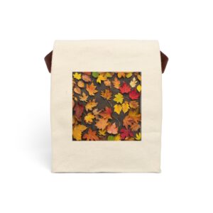 Canvas lunch bag with strap featuring a design of colorful autumn leaves in shades of red, orange, and yellow