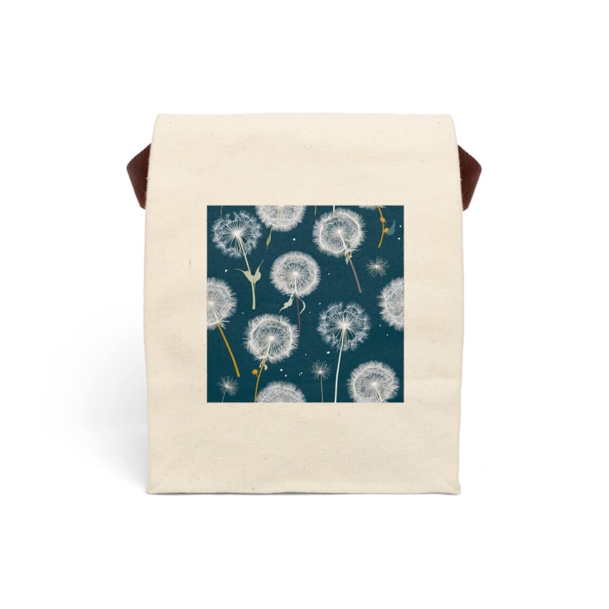 Canvas lunch bag with strap featuring a dandelion seed pattern on a dark background