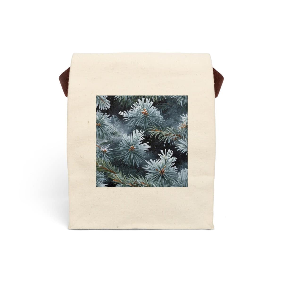 Canvas lunch bag with strap featuring a close-up design of frosted evergreen branches